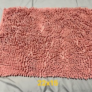 Pink bath mat